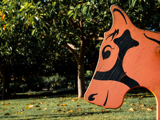 wooden head of a rocking horse in a children's playground