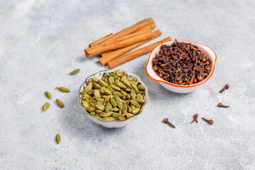 Dry Organic Cloves in a spoon.