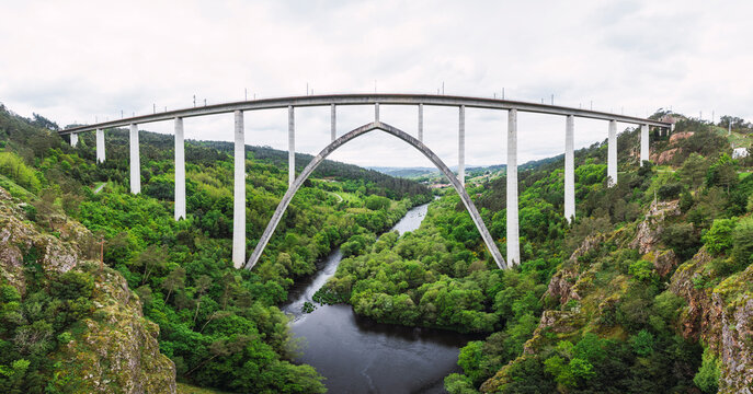 Spain, Province of A Coruna, Vedra, Panoramic view of Gundian Bridge arching over Ulla river