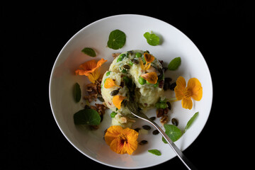 VEGAN DISH , RICE PEAS EDIBLE NASTURTIUM FLOWERS & LEAVES