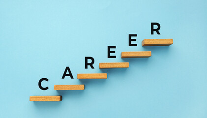 Career word on staircase on blue background. Increasing business, success process concept. Copy space