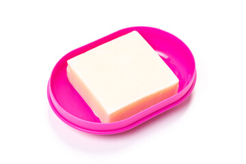 Travel soap in plastic soap dish isolated on white background