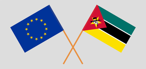 Crossed flags of the European Union and Mozambique. Official colors. Correct proportion