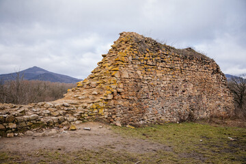 Velemin &ndash; Oparno, Czech Republic, 27 February 2021: Stone gothic ruins of old medieval castle Oparno, ancient fortress in winter day, landmark in countryside, stronghold on the hill