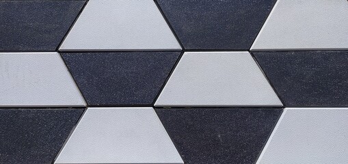 black and white luxury interior and exterior brick block tile stone or cobblestone with copy space. Abstract geometric architecture background texture pattern. Beautiful close up macro top view.