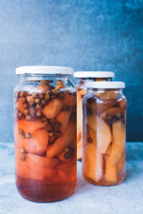 Homemade preserved fruits, on blue background. Nutrition concept. Diet. Weight-loss