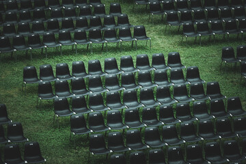 Closeup shot of empty chairs on a field