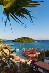 Beautiful Ksamil beach of blue Ionian sea, Albania - obrazy, fototapety, plakaty
