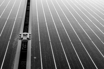 Side support bracked between solar panels on a new installation on a residential roof