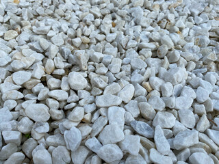 White small pile abstract light stones material texture background