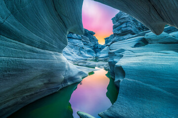 Tasyaran canyon, which attracts attention with its rock shapes similar to Antelope canyon in Arizona, offers a magnificent view to its visitors. Canyon view and stream at sunset. nature landscape. 