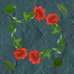 branches of red roses in the form of a frame on a dark paper background