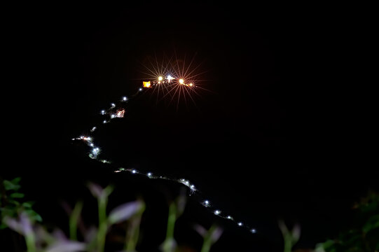 The light path to Adam's peak on Sri Lanka at night