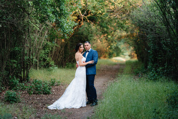 A couple in love a guy and a girl on a walk in the forest belt