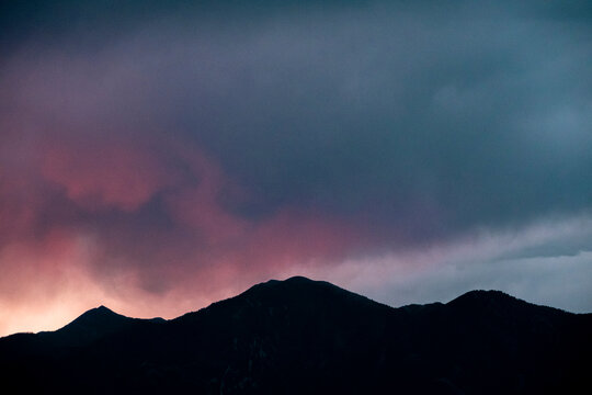 Pink And Orange Sunset Over Mountains