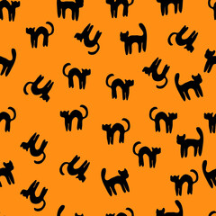 Hand drawn seamless pattern with black cats on yellow background. Doodle style. Suitable for wrapping paper, textiles, notebook and  covers, clithes, bags, scrapbooking and wallpaper.