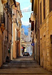 Fototapeta na wymiar Medieval Street Conducing to Piazza Duomo at L'Aquila, Abruzzo, Italy