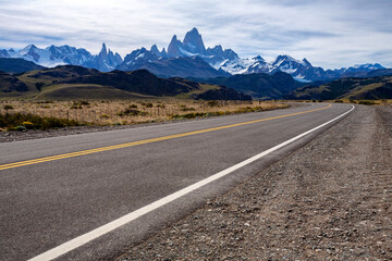 Naklejka premium Scenic view of the road to El Chalten town. Fitz Roy Cerro Torre mountains range hiking climbing adventure paradise. Patagonia Argentina los glaciares national park