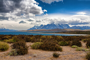 Fototapeta premium Scenic view of Torres del Paine cuernos and lago lake Pehoe mountains range. Torres del Paine national Park, Patagonia Chile