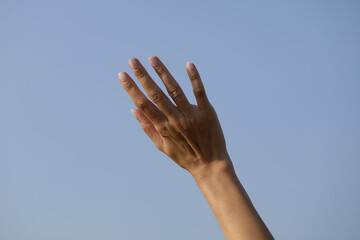 hands on sky background