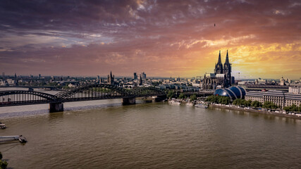 Fototapeta na wymiar The bridges over River Rhine in Cologne - COLOGNE, GERMANY - JUNE 25, 2021