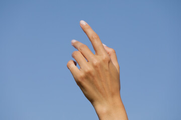 hands on sky background
