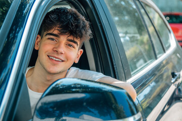 novice driver in the car smiling