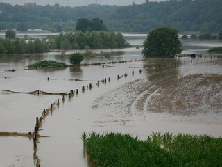 Ruhr near Hattingen and Bochum in Germany during the July floods in 2021, the river overflowed its banks and is now almost 2 kilometers wide, in normal times only about 30 to 50 meters - obrazy, fototapety, plakaty