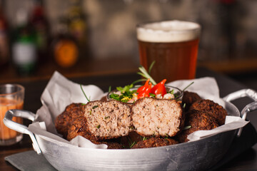Spiced Brazilian meat dumplings, served with vinaigrette