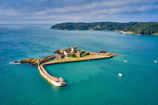 Aerial drone image of St Aubn's Fort at high tide in the sunshine. Jersey Channel Islands