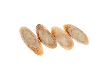 Chinese herbal medicine astragalus membranaceus on a white backg