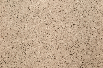 beige granite stone surface texture in full frame