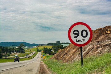 Brazilian signpost for 90km maximum speed on the road - Powered by Adobe