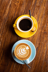 delicious coffee in beautiful cups, morning ritual, a human holds a cup of coffee. strong coffee filter and cappuccino