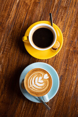 delicious coffee in beautiful cups, morning ritual, a human holds a cup of coffee. strong coffee filter and cappuccino
