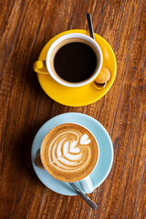 delicious coffee in beautiful cups, morning ritual, a human holds a cup of coffee. strong coffee filter and cappuccino
