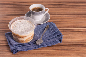 coconut pot cake on wooden background