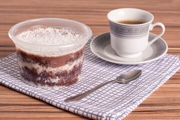 coconut and chocolate pot cake on wooden background