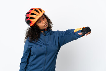 Teenager cyclist woman isolated on white background giving a thumbs up gesture