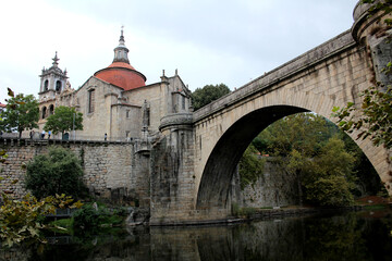 Fototapeta na wymiar Saint Goncalo Bridge and medieval church at the historic center of Amarante, northern Portugal