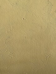 yellow putty rough wall background texture