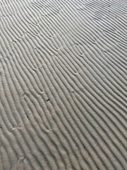 wavy sea sand texture background closeup