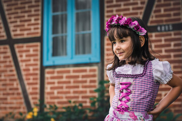 girl dressed in German in the garden
