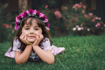 girl dressed in German in the garden