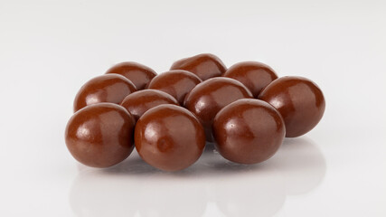 chocolate balls on white background