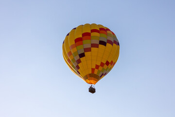 Colorful hot air balloons over blue sky in California