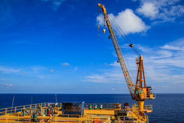 Crane lifting storage tank