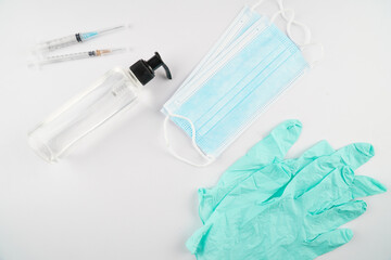 Prevent Coronavirus, Disposable surgical Medical Mask, Hand sanitizer, Syringe, Latex Glove protective against Coronovirus Covid-19, , Flat Lay Concept