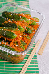 Fermented cucumbers with carrots and spices.