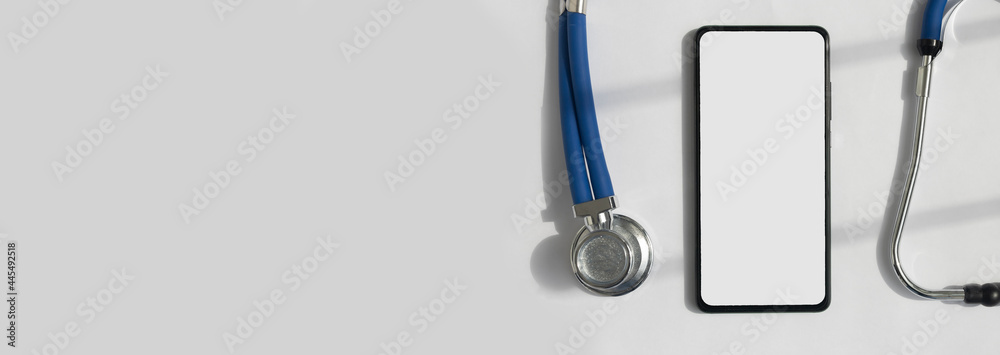 Aufkleber Mobile phone mockup with stethoscope over white background with copyspace. Template with white screen of smartphone.